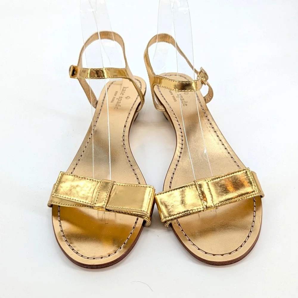 NWOT Kate‎ Spade NY Gold Metallic Leather Bow Sandals Low Kitten Wedge Size 8M